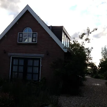 Koetshuis De Polderruimte Holiday home