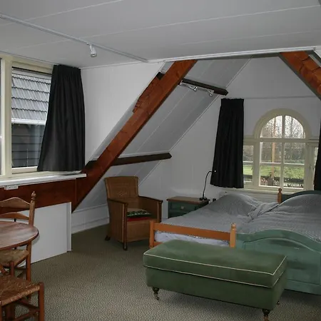 Holiday home Koetshuis De Polderruimte